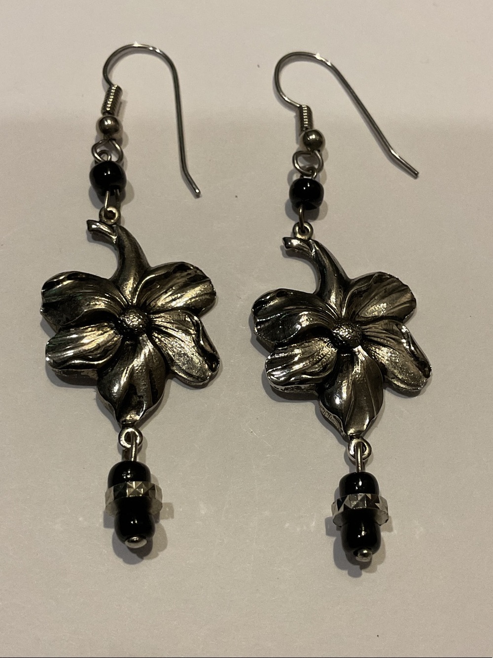 Silver Floral Drop Earrings with Black Bead Accents